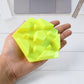 Compact plastic mobile phone stand for desk use in random color