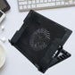 Sleek black laptop cooling pad with fan and adjustable stand, ready for use.