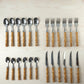 Kitchen spoon and fork set in stainless steel