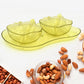 Apple-shaped plastic serving tray filled with assorted snacks.