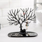 Side view of deer shaped jewellery holder showcasing antler branches and oval tray
