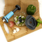 All components of the hand push vegetable cutter, including blades and container, ready for assembly.
