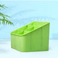 Multi-purpose clear plastic storage box on a wooden living room shelf.