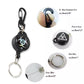 Compact retractable key chain holding keys and an ID card, demonstrating its use.