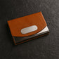 Leather and metal business card organizer combining style and durability