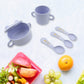Individual components of the 7-piece bamboo fibre baby feeding set, including the cutlery and plate.