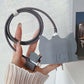 Detailed view of the silicon charger case highlighting its protective features.