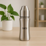 Ganesh 250ml stainless steel baby bottle with anti-colic nipple, ideal for infants.