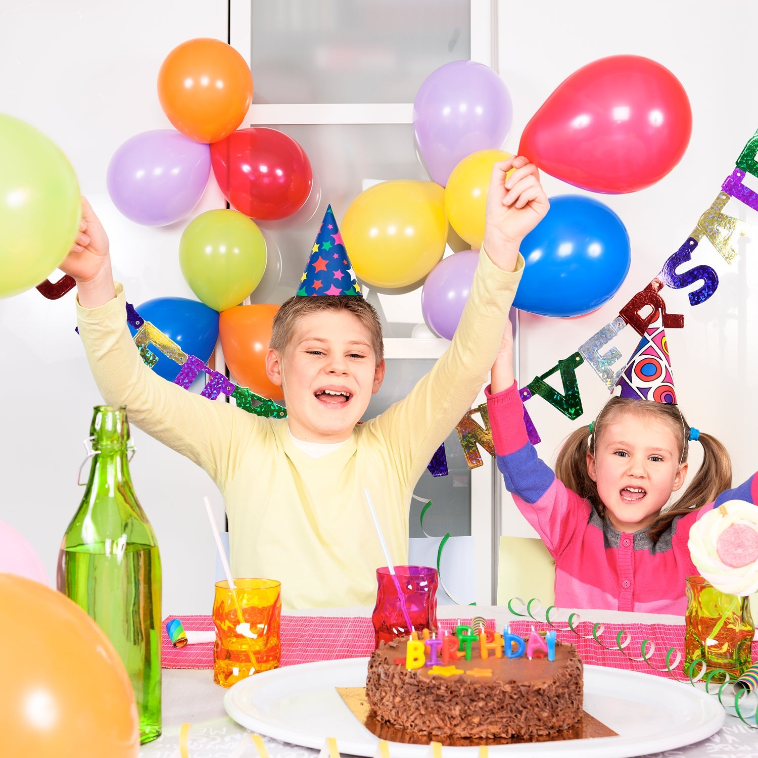 Close-up of inflated party balloons in various bright colors.