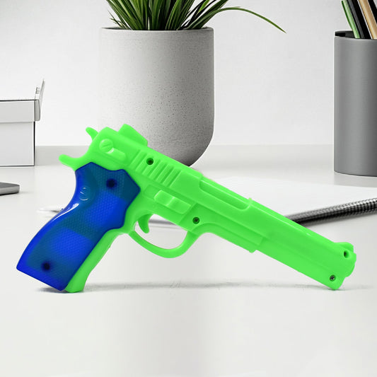 Side view of the Aditi toy gun, ready for play.
