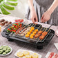Non-stick steel grill plate with cool-touch handles for easy and safe cooking.