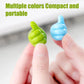 Versatile WipeTech cable clips used as wall hooks for small items.