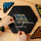 Components of the Triangle Color Matching Puzzle Board Game showing vibrant colored pegs