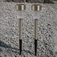 Weatherproof solar path light standing in a garden with green foliage