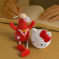 USB cartoon mini table fan with kitty character and red suit on desk
