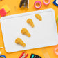 Another view of the chicken erasers in their retail packaging, highlighting their readiness as a gift.