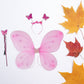 Front view of the multi-color butterfly wings costume set for young girls.