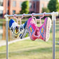 Side view of the hanging shoe organizer with a pair of shoes, demonstrating its stability.