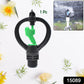 Butterfly-shaped garden sprinkler nozzle distributing a gentle, even spray across plants.