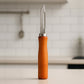 Quickslice wooden handle stainless steel vegetable peeler on a clean white background.