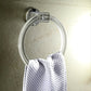 Frontal perspective of the clear ABS towel ring, showcasing its sturdy circular design.