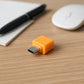 Micro USB OTG Adapter connected to a USB flash drive, enabling data transfer.