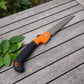 Heavy duty folding garden hand saw with sharp toothed steel blade and ergonomic grip