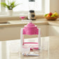 Side view of compact pink manual ice gola maker
