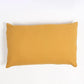 Elegant pillow cover displayed on a bed, enhancing the bedroom's aesthetic.