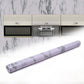 Roll of marble kitchen wallpaper with realistic white and grey pattern