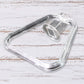 Close-up view of the durable ABS plastic material of the square towel ring.
