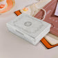 Side profile of the elegant stainless steel jewelry storage box.
