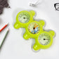 Indo Glow precision desktop clock from an elevated angle, highlighting its compact design.