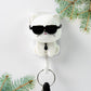 Detailed view of the cute cat face and interactive sunglasses feature on the wall hook.