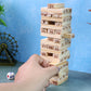 Wooden Tumbling Tower Game in progress showing stacked numbered blocks