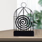 Elegant vintage iron mosquito coil holder with intricate birdcage design.