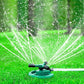 Close-up view of the 3-arm rotating sprinkler's water jets in action.