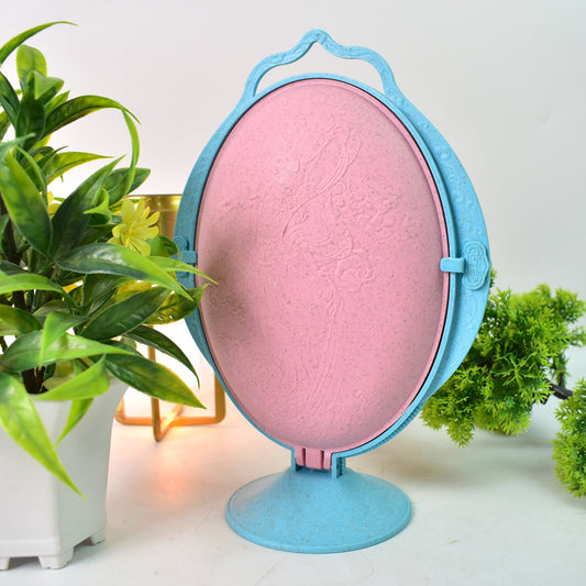 Close-up of reflective fruit dish highlighting mirror surface