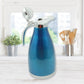 Ergonomic handle design on the Bottlart stainless steel kettle jug for comfortable grip.