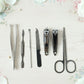 Portable manicure and pedicure tool set in a compact case for travel