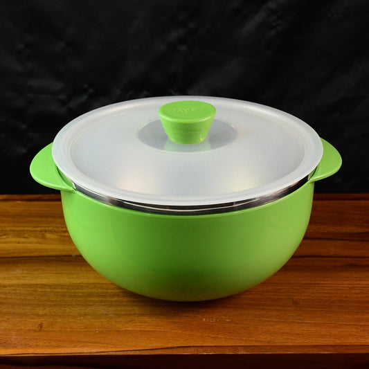 Ergonomic serving bowl with side handles and vented plastic lid