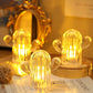 Three cute cactus lights displayed together, showcasing their unique design and soft illumination.