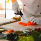 2-in-1 Food Chopper with ergonomic handle, ready to slice vegetables.