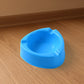 Plastic ashtray with wide bowl and cigarette rest slots in sky blue