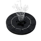 The solar floating water fountain demonstrating a wide, gentle spray pattern in a garden pool.