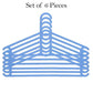 Detailed view of the hook on a plastic clothes hanger, designed for stability.