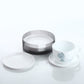 Durable plastic coasters effectively protecting a wooden surface from drink stains.