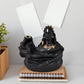 Side view of the Adiyogi Shiva Backflow Incense Holder, highlighting the smoke fountain design.