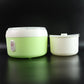 Side profile of the green electric yogurt maker, a versatile kitchen appliance.