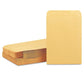 Brown kraft envelope with an elegant invitation card partially inserted.